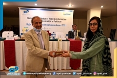 Ms. Shazia Mehboob (RTI Award winner in journalist category) receiving RTI Award from Muhammad Azam Chief Information Commissioner Pakistan Information Commission